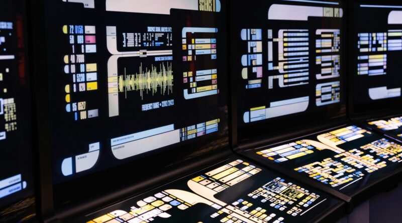 High-tech command center with advanced digital displays and control panels